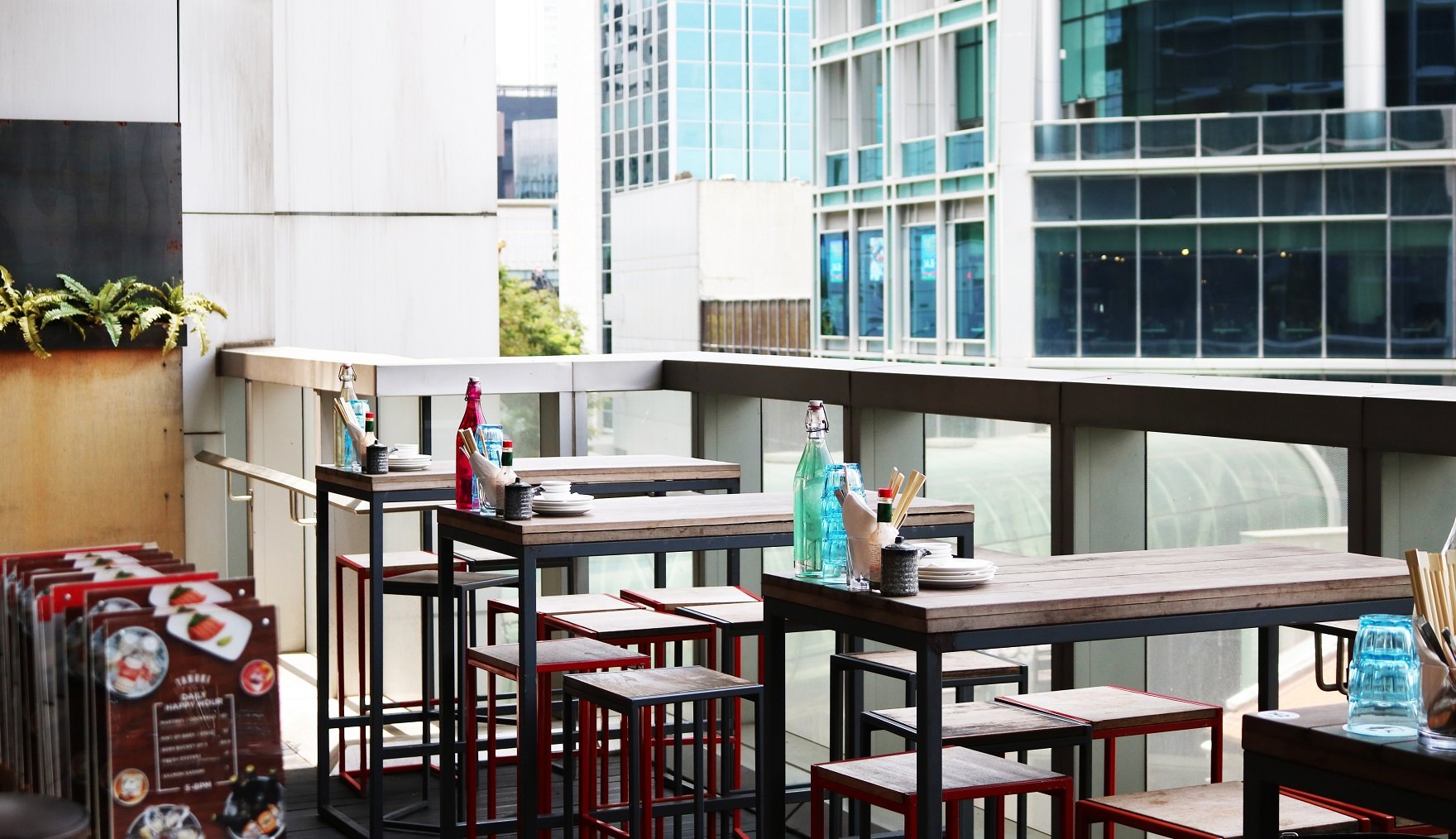 Tanuki Raw alfresco balcony — outdoor seating at Orchard Central Singapore